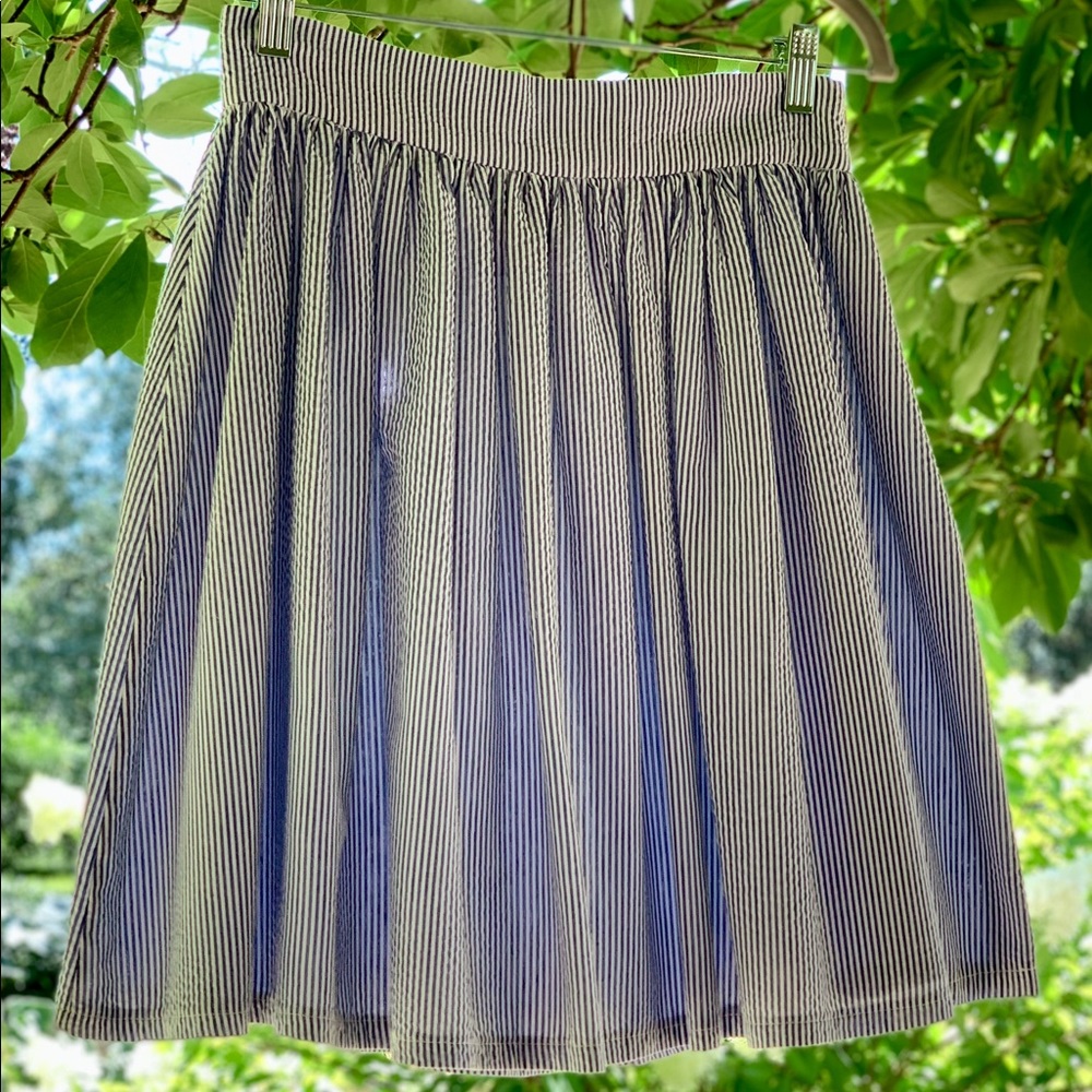 Country club style white and blue stripe short skirt.